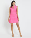 Smiling model in the Jude Connally Kristen Dress - Garden Gate Spring Light Pink