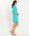 Side view of model in the Jude Connally Susanna Dress - Trellis Trio Aqua