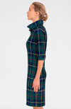 Side view of the GS Everywhere Dress. Green plaid dress with 3/4 sleeves and a popped collar