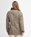 Back view of the Barbour Beadnell Polarquilt Jacket - Sand Dune. Highlighting collar and cuff plaid