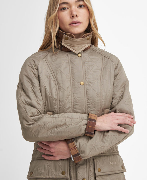 The Barbour Beadnell Polarquilt Jacket - Sand Dune with wind guard up